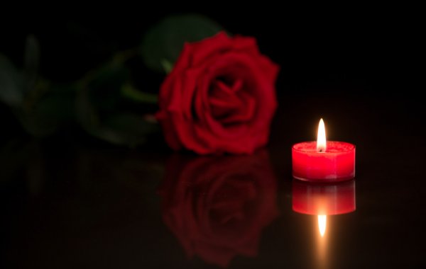 depositphotos_24118521-stock-photo-romantic-candle-with-red-rose